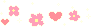 Small, pixelated pink hearts and flowers surrounded with white sparkles.